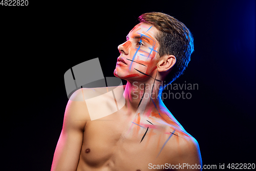 Image of young man with body paint