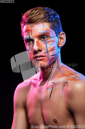 Image of young man with body paint