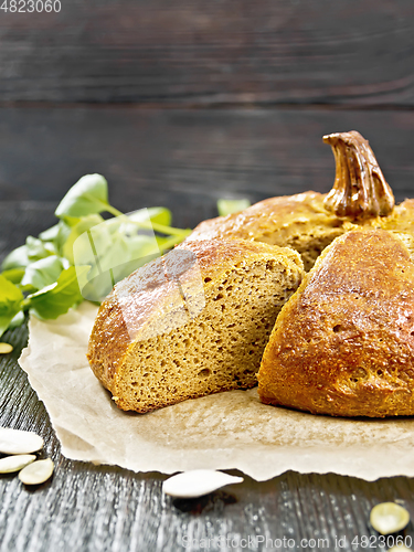 Image of Bread pumpkin cut on a board