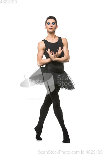 Image of handsome ballet artist in tutu skirt
