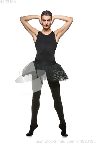 Image of handsome ballet artist in tutu skirt