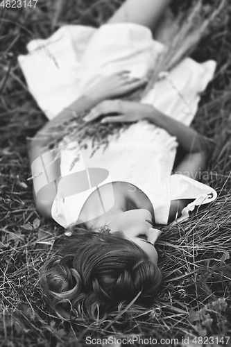 Image of beautiful girl in field