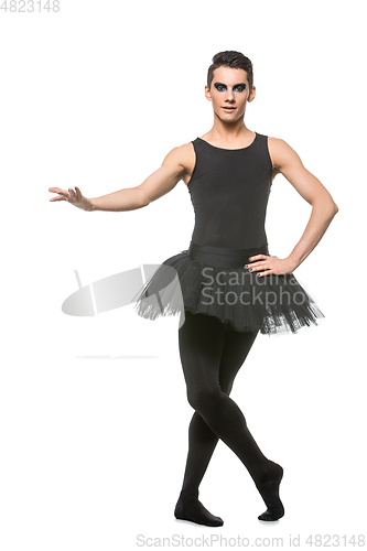 Image of handsome ballet artist in tutu skirt