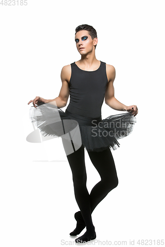 Image of handsome ballet artist in tutu skirt