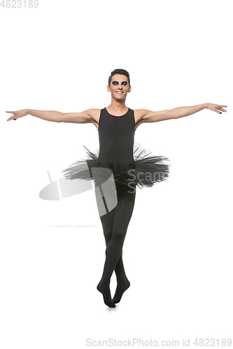 Image of handsome ballet artist in tutu skirt