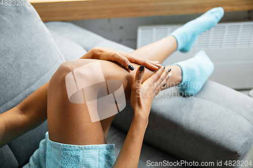 Image of Beauty Day. Woman doing her daily skincare routine at home