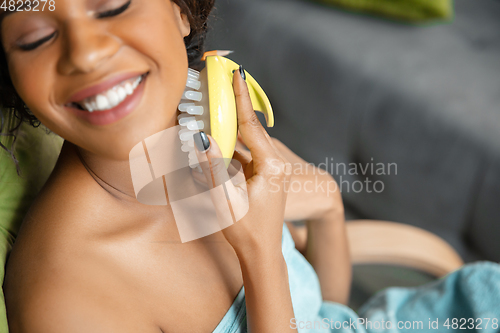 Image of Beauty Day. Woman doing her daily skincare routine at home