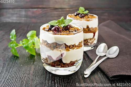 Image of Dessert Black Forest in two glasses on wooden board