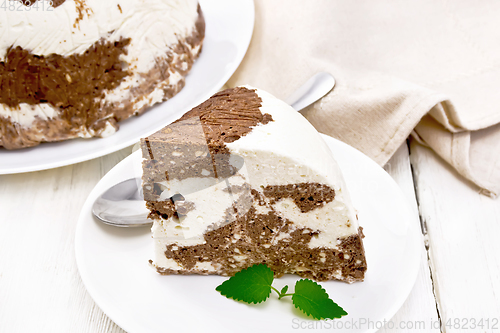 Image of Dessert of curd and chocolate on light board