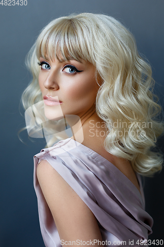 Image of beautiful girl in pink dress