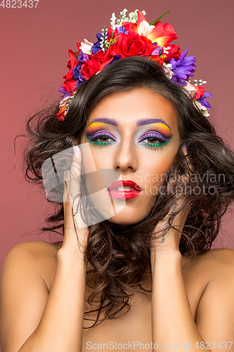 Image of beautiful girl with flower accessories