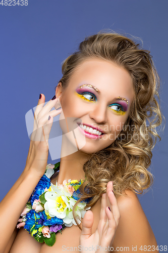 Image of beautiful girl with flower accessories