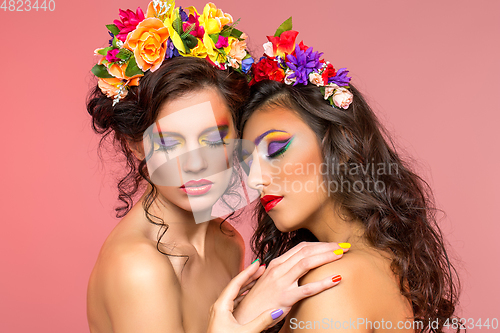 Image of beautiful girls with flower accessories