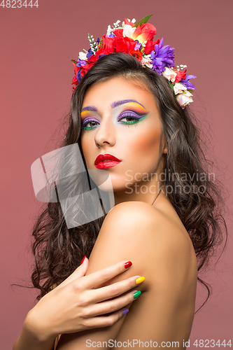 Image of beautiful girl with flower accessories