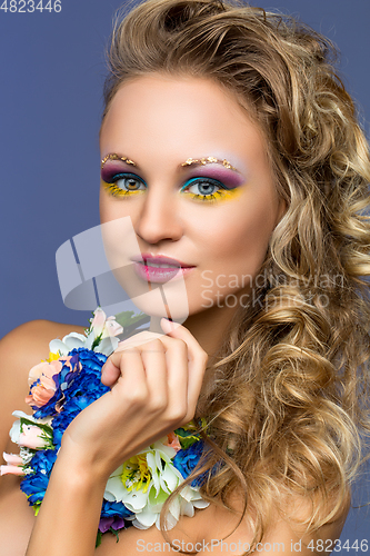 Image of beautiful girl with flower accessories