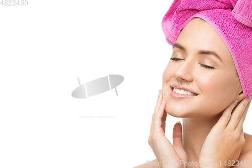 Image of girl in pink towel on head isolated on white
