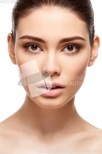 Image of girl with nude pink lipstick isolated on white