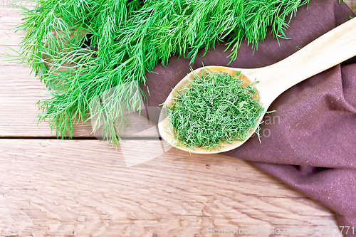 Image of Dill dry in spoon on board top