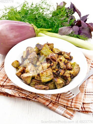 Image of Eggplant fried on light wooden board