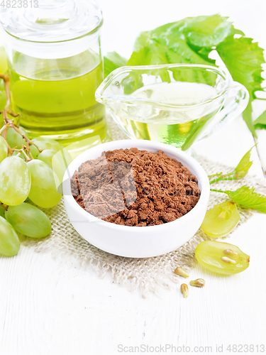 Image of Flour grape seed in bowl on white board