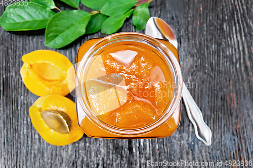 Image of Jam apricot in jar on board top