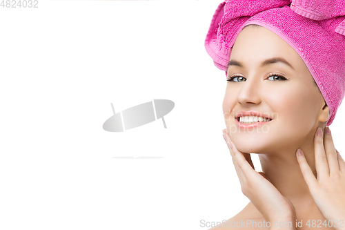 Image of girl in pink towel on head isolated on white