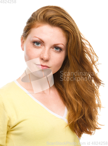 Image of Portrait of a young cheerful woman