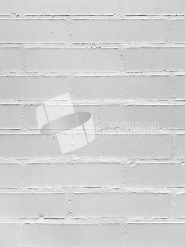 Image of Brick wall painted with a white paint 