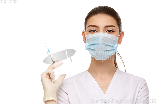 Image of woman doctor in rubber gloves isolated on white