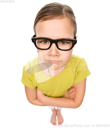 Image of Portrait of a little girl wearing glasses