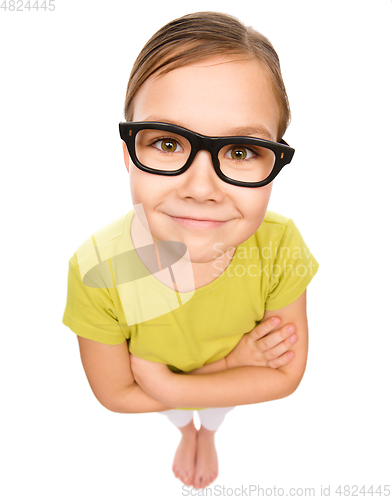 Image of Portrait of a little girl wearing glasses