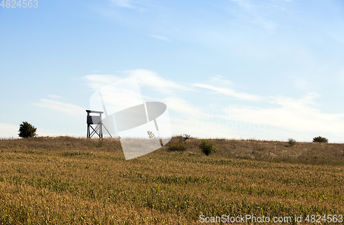 Image of wooden tower, field