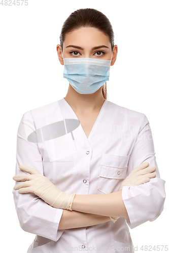 Image of woman doctor in rubber gloves isolated on white