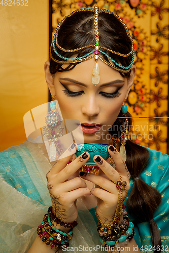 Image of beautiful arabic style bride in ethnic clothes