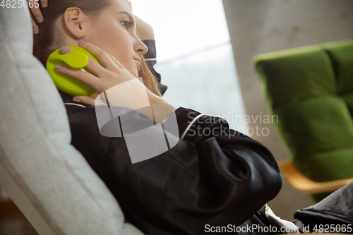 Image of Beauty Day. Woman doing her daily skincare routine at home