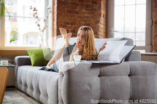 Image of Beauty Day. Woman doing her daily skincare routine at home