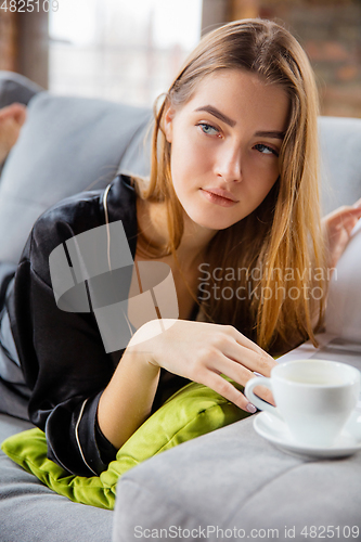 Image of Beauty Day. Woman doing her daily skincare routine at home