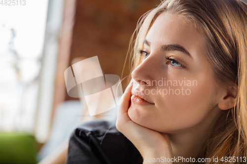Image of Beauty Day. Woman doing her daily skincare routine at home