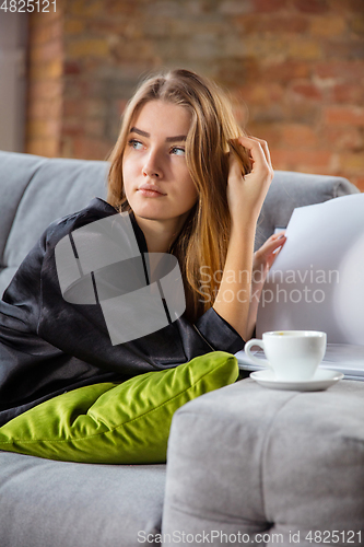 Image of Beauty Day. Woman doing her daily skincare routine at home