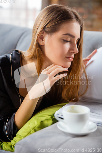 Image of Beauty Day. Woman doing her daily skincare routine at home