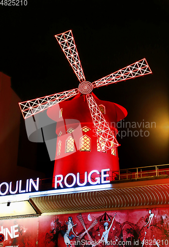 Image of View of the Moulin Rouge (Red Mill) at night in Paris, France