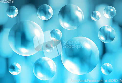 Image of Abstract blue background with transparent 3d bubbles