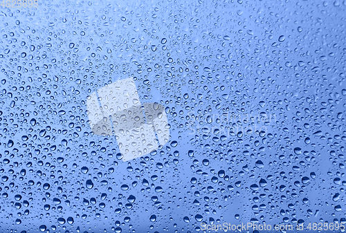 Image of Water drops on glass, natural blue texture