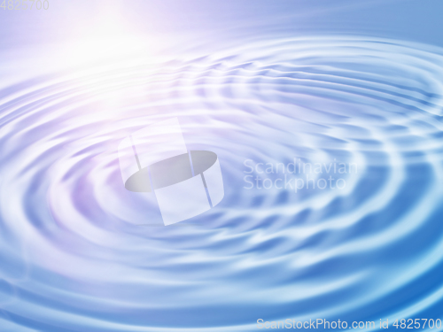 Image of Abstract background with wavy ripples and sunlight