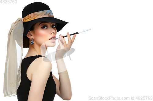 Image of beautiful young woman in retro style with cigarette