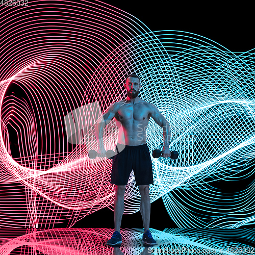 Image of Creative sport and neon waves on dark neon lighted line background