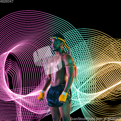 Image of Creative sport and neon waves on dark neon lighted line background