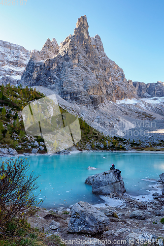 Image of The frozen Sorapiss lake and majestic Dolomites Alp Mountains