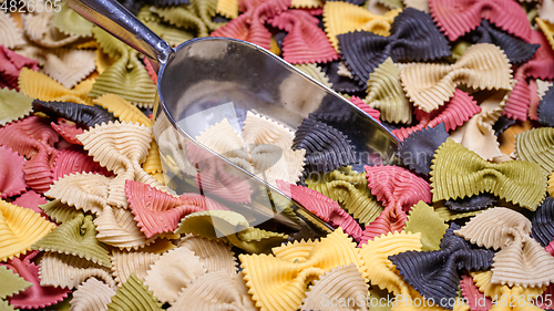 Image of Colored Farfalle Pasta bow tie pasta background.