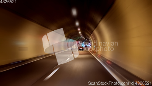 Image of Car rides through the tunnel point-of-view driving